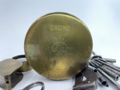 Lot # 81 – Trinket box lot. Vintage Alcatraz prison tags, old keys, casino Monte Carlo brass tin, Coca-Cola wall bottle opener, & more - Image 5