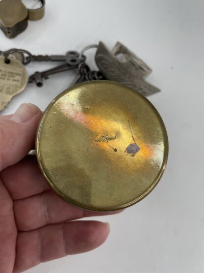 Lot # 81 – Trinket box lot. Vintage Alcatraz prison tags, old keys, casino Monte Carlo brass tin, Coca-Cola wall bottle opener, & more - Image 6