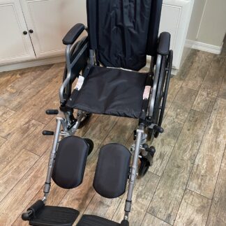 Lot # 75 - Wheelchair w/ leg supports.