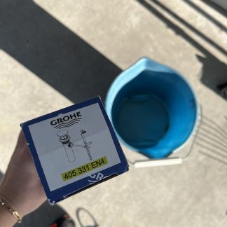 Lot #133 - Blue bucket and sink plugs