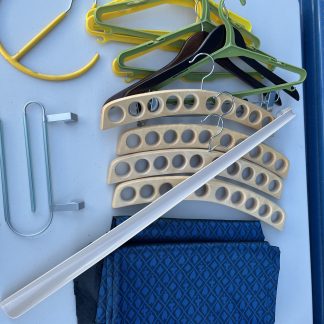 Lot #144 - Various Clothes Hangers / Fabric / Long Shoe Horn