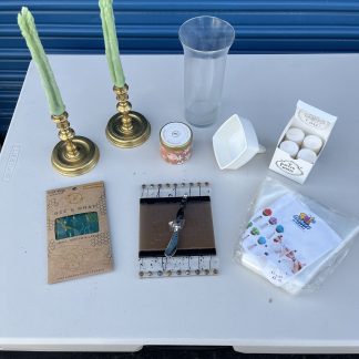 Lot #243 - (2) Gold Plated Candle Sticks with Asparagus Candle Sticks / Hand Painted Glass Cheese Board and Knife / Clear Glass Vase / Candles / Funnel / Piping Bags / Sustainable Food Storage