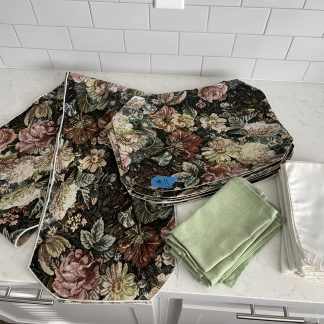 Lot #11 - (8) Tapestry Placemats / (6) Light Green Linen Napkins / (8) White Linen Napkins (some stains) / (1) Tapestry Table Runner