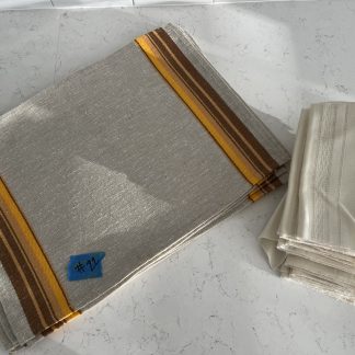 Lot #22 - (6) Tan and Yellow Placemats / (12) Cream colored Linen Napkins
