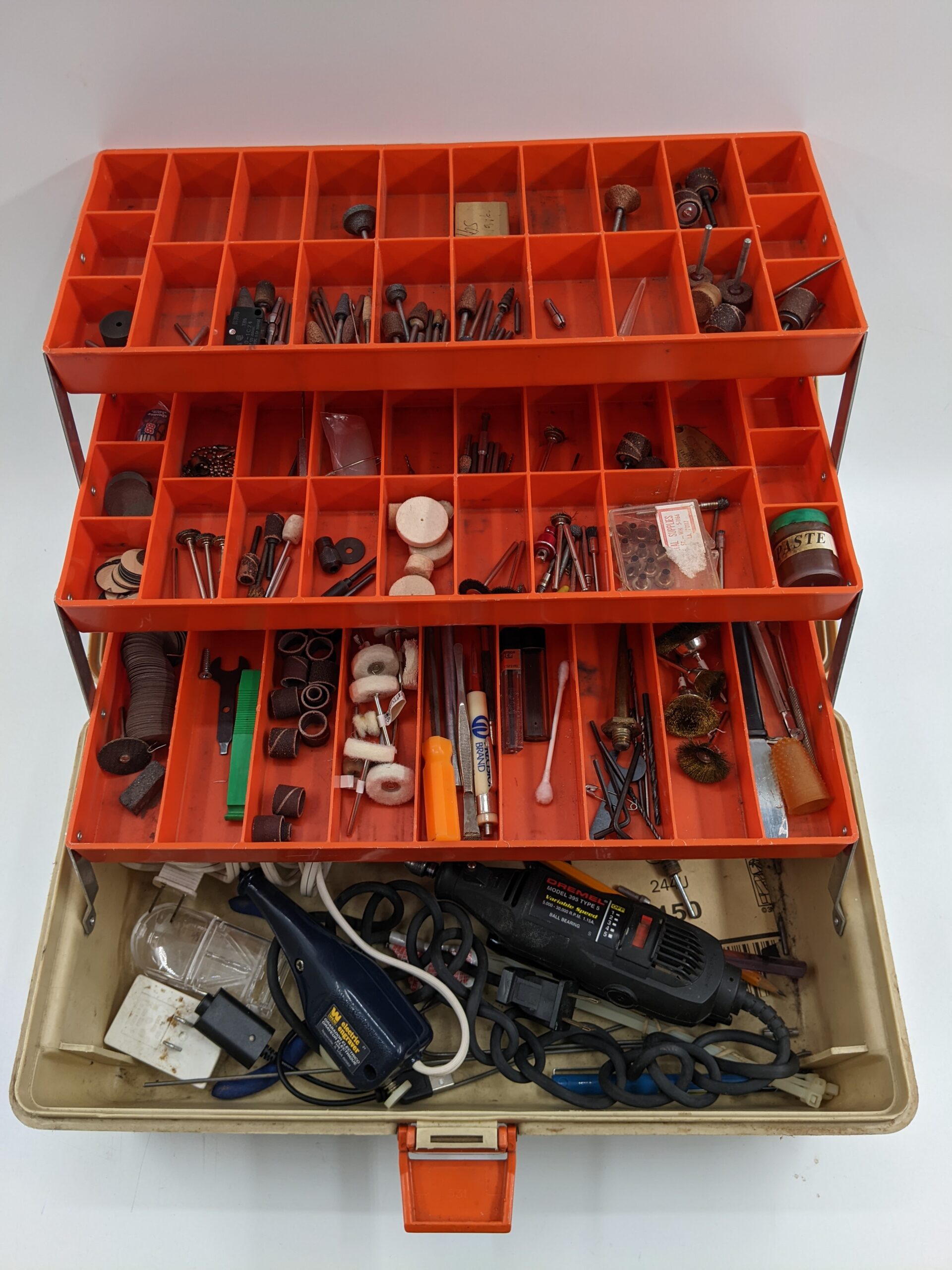 Lot # 15 – Fishing box filled with Dremel & accessories