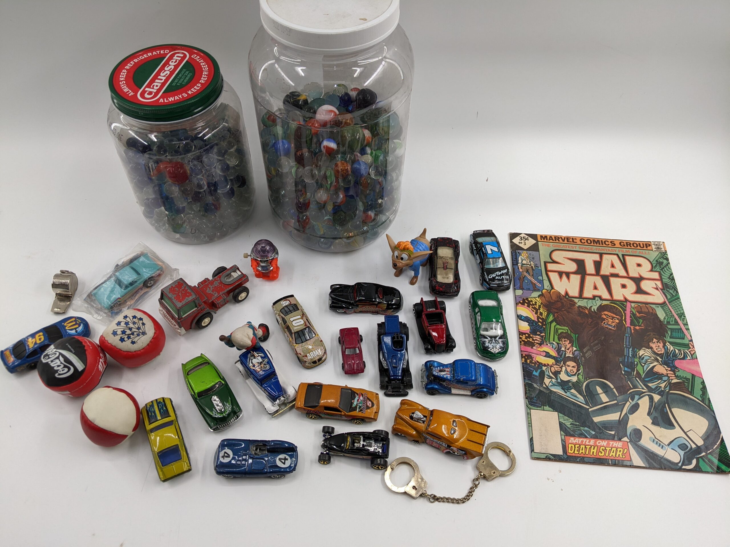 Lot # 24 – Large assortment of Marbles (over 10 lbs.), hot wheels & other toys