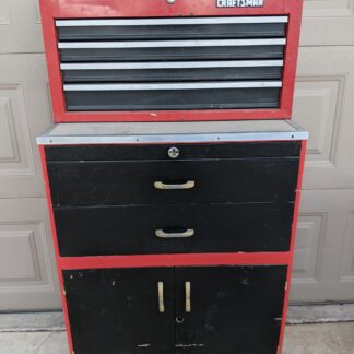 Lot # 20 - Red rolling tool chest / cabinet combo w/ a large assortment of tools.