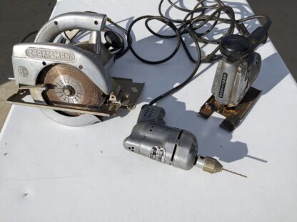 Lot # 52 – Vintage power tools. Hand saw, drill, saber saw