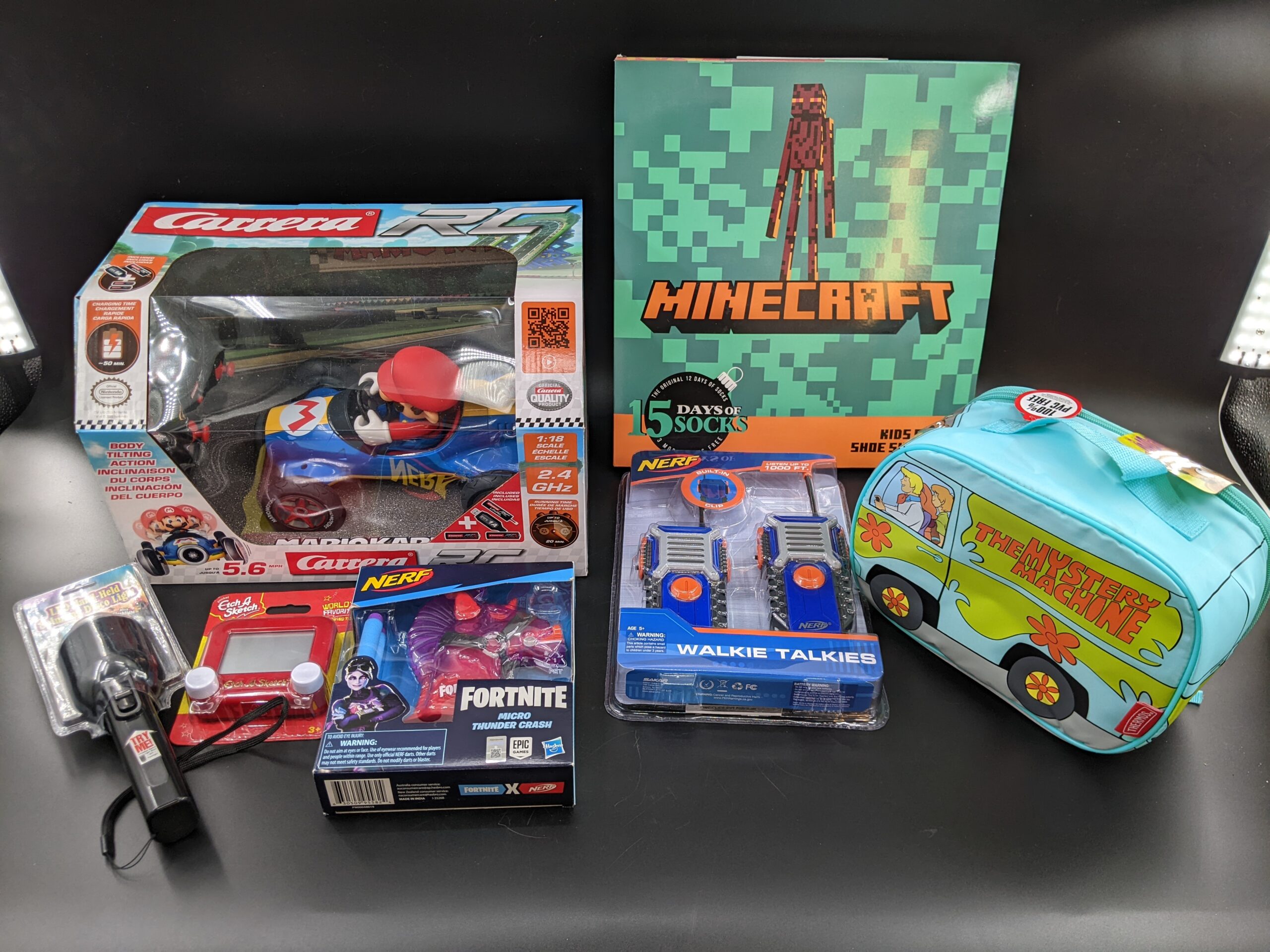 Lot # 79 – Toy Lot Mario, Minecraft, Fortnite, Scooby-doo, walkie talkies ALL NEW