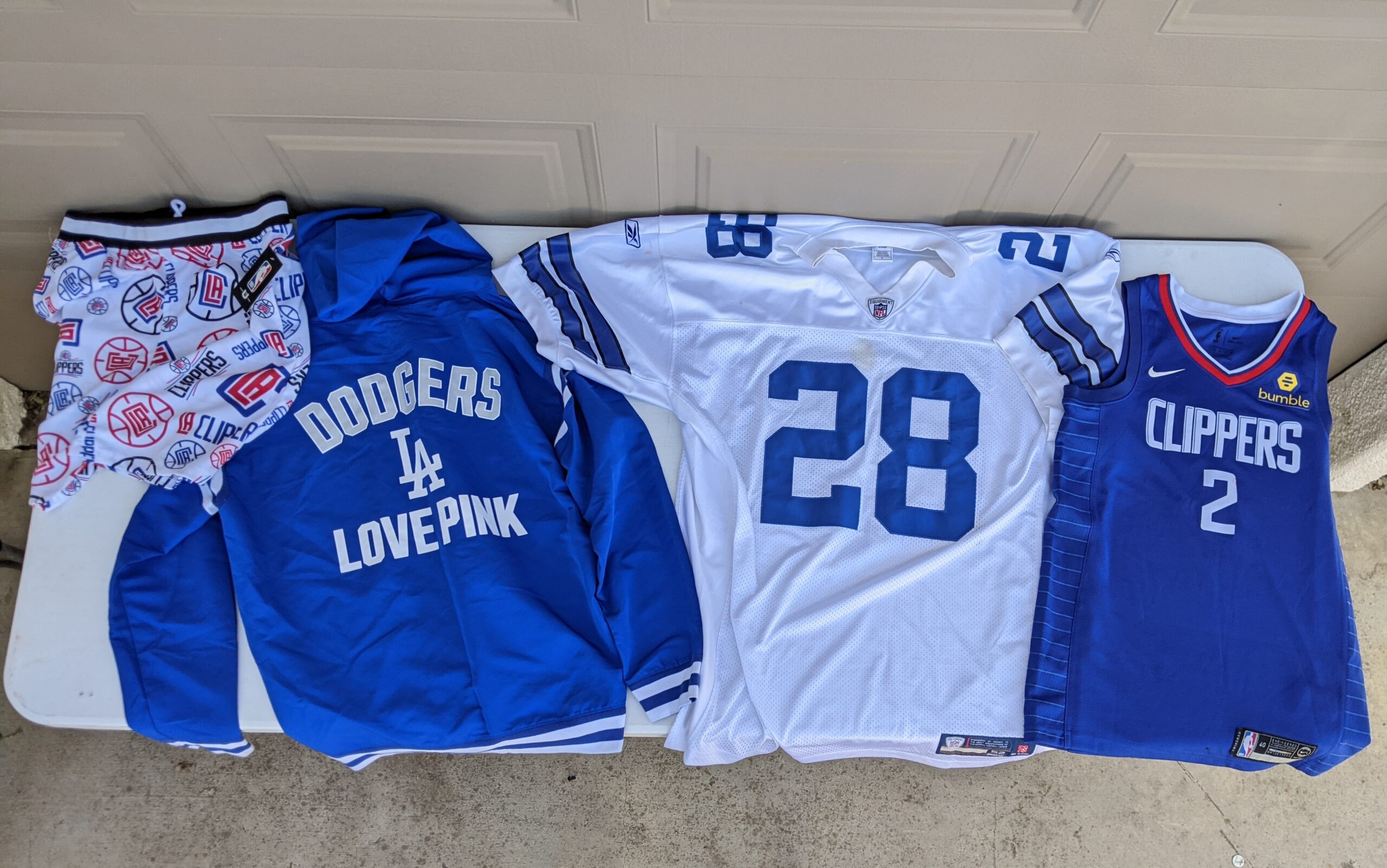 Lot # 94 – Adult Sportswear lot- Nike, Reebok, NBA, Dodgers, VS Pink