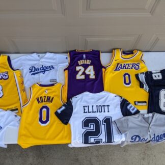 Lot # 96 - Kids Sized Jerseys - Lakers, Dodgers, & Cowboys