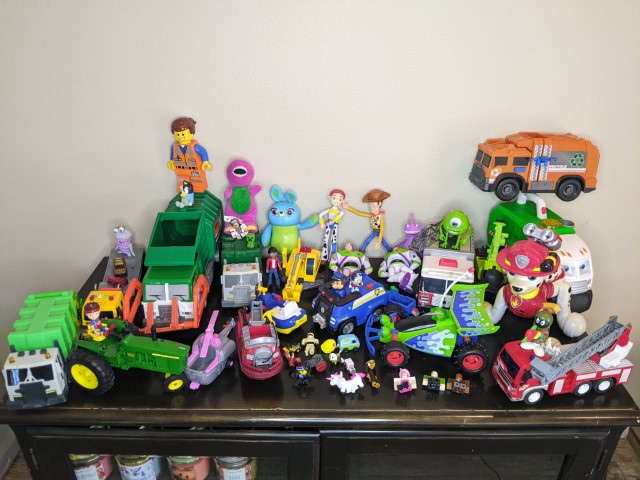 Lot # 98 – Huge toy lot! Tonka trucks, Toy Story, Paw Patrol, John Deere and much more!