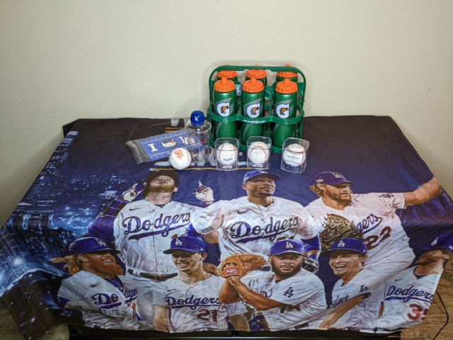 Lot # 126 – Sports Lot: Dodgers banner, Signed baseballs, and more!