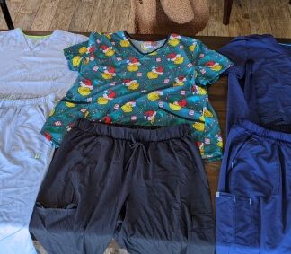 Lot # 131 - Lot of Women Scrubs: Blue size xl scrubstar, light blue size xl scrubstar, and Dr. Seuss size 2xl