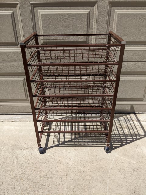 Lot # 149 – Rolling metal basket shelves.
