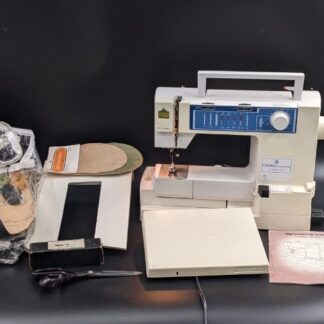 Lot # 151 - Vintage Viking Husqvarna Classica 105 Sewing Machine with accessories!