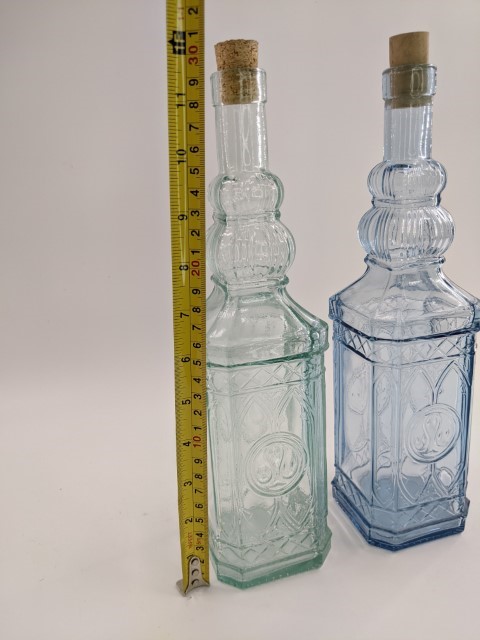 Lot # 167 – Ornate Recycled Glass Bottles with Corks - Image 3